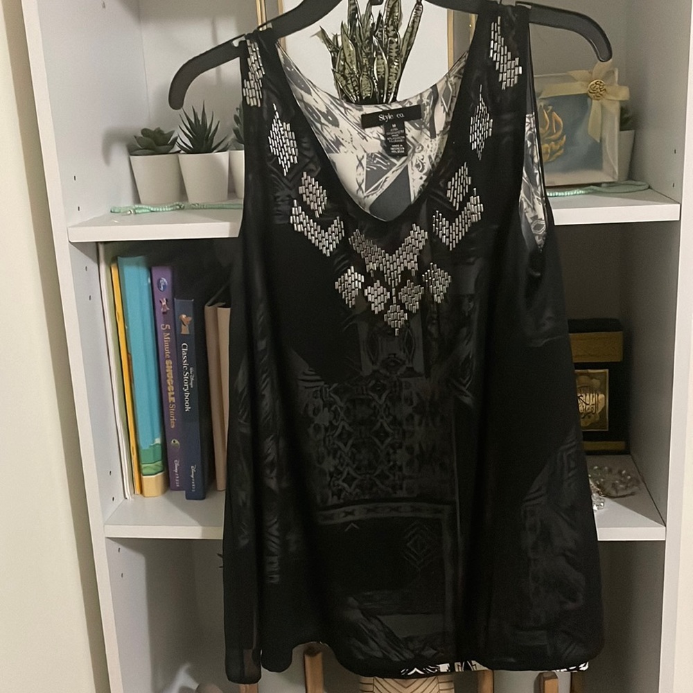 Black flare sleeveless top